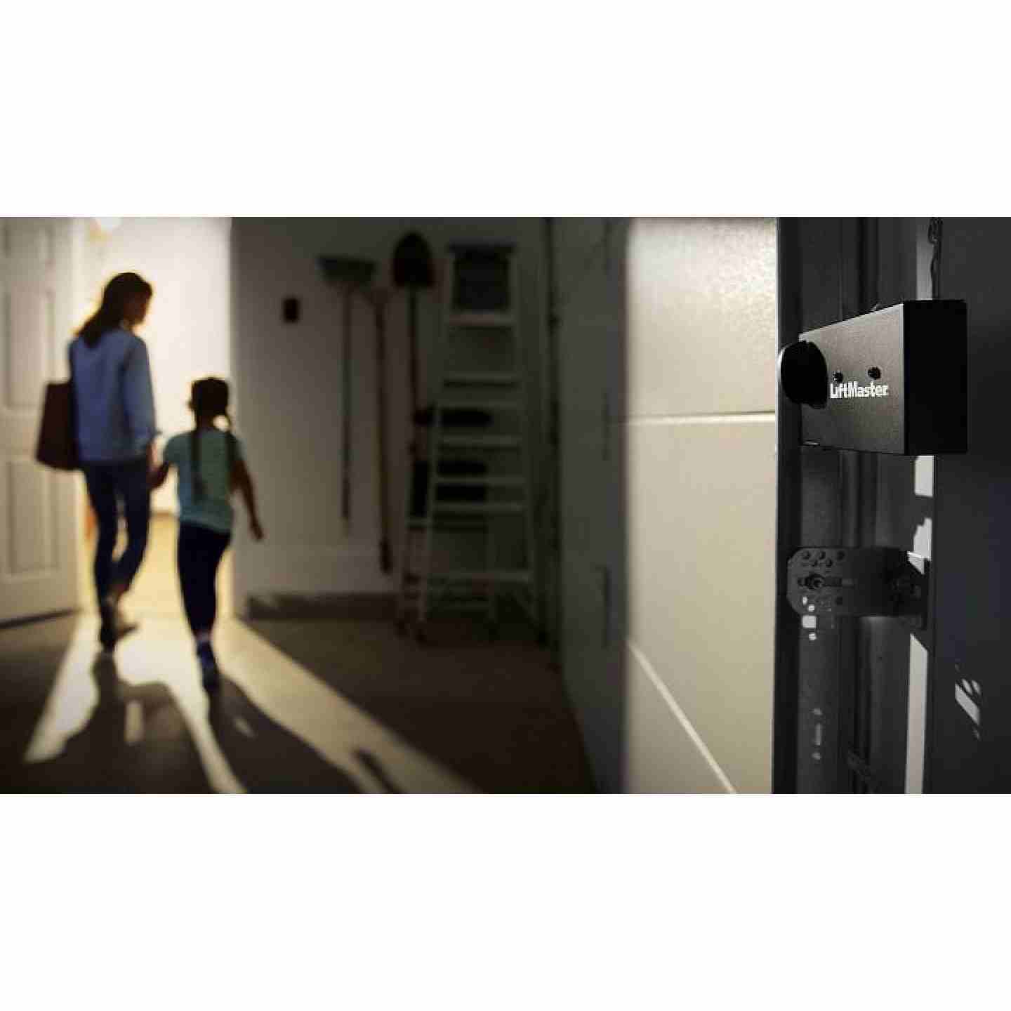 Mom and Daughter Walking into House with LiftMaster 98022 in Garage Door